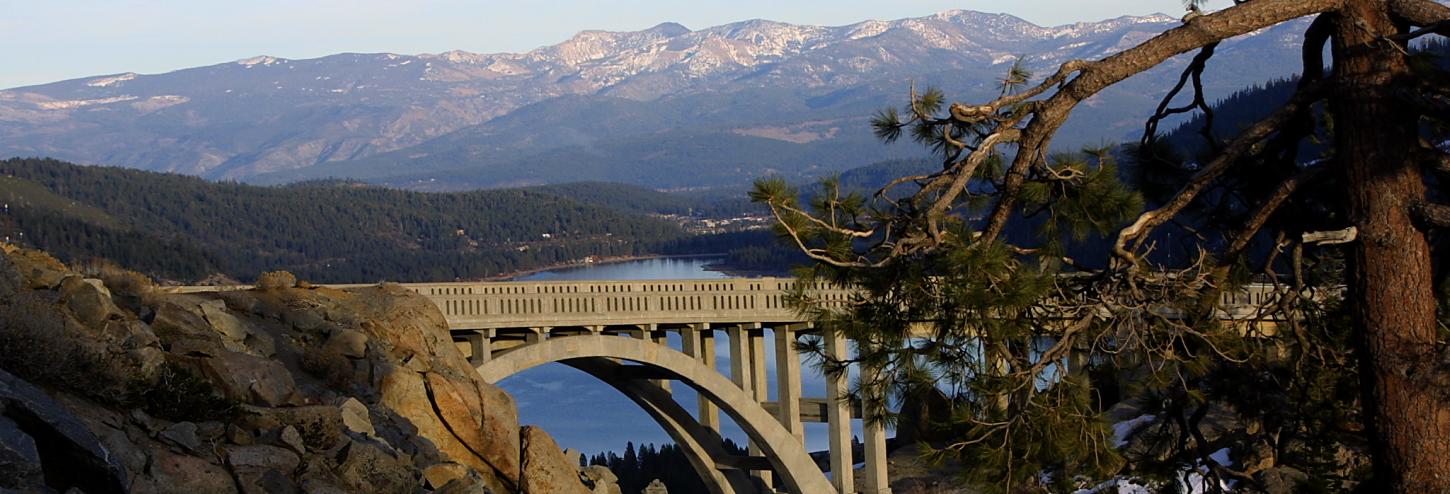 large bridge with donner lake in the background